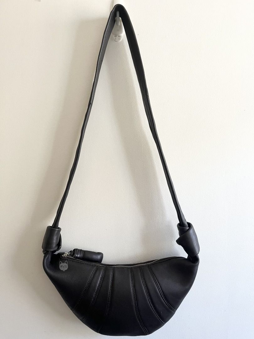 Croissant Bag (Category: Luxury Bags & Wallets) located in Bacoor. Submitted by 2nds.pop (Listing ID 1432211961, Image 2). Description: READ IMPORTANT NOTES FIRST. Bought here in Carousell, 14 Apr 2026. Selling 15 April 2026. Never personally worn outside. No inclusions. No official dust bag. No white tags inside the bag. YKK zipper. Seller claimed it was thrifted somewhere in the province. There is a heat stamp of the brand name inside but authe