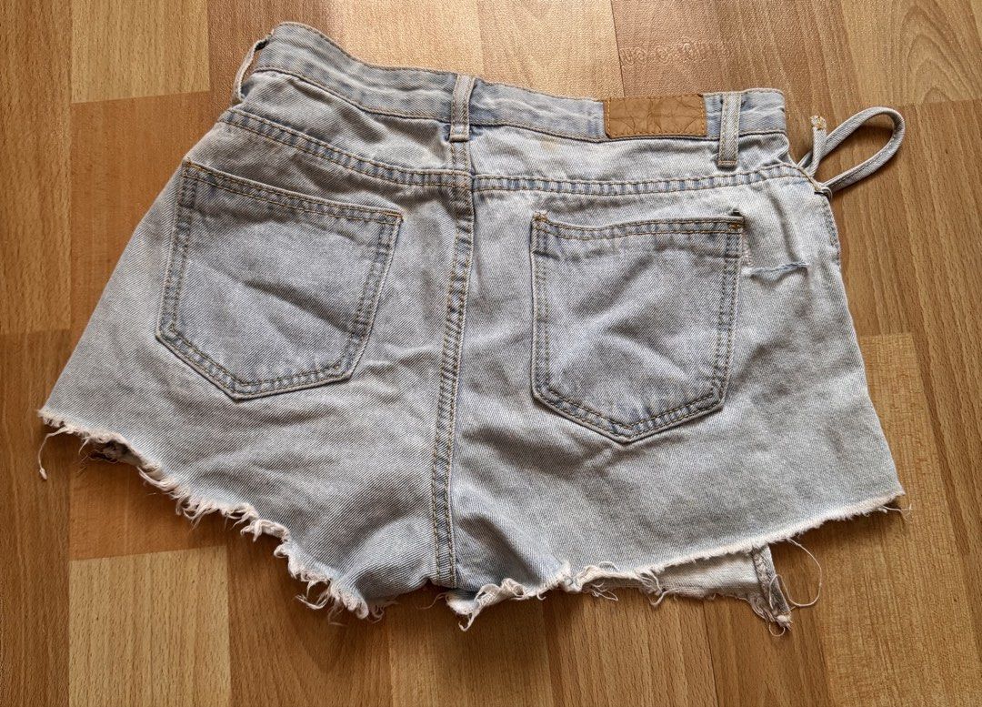 Denim Shorts with Tie Detail (Category: Shorts) located in Pasig City. Submitted by shobfinds.ph (Listing ID 1432225183, Image 3). Description: No Brand Color: light washed Style: Skort 📸Attached photo when worn 📏Dimensions (Laid-Flat): Waist: 13 inches Lenght: 10 inches ⚠️Unoticeable flaw: Wear and tear back right pocket 💳Mode of Payment 💙Gcash ❤️BPI 🛵Mode of Delivery: Standard delivery - J&T Express Same day delivery - Grab Express/Lalamov