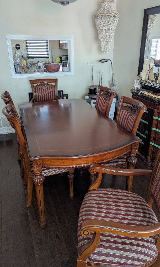 Dining Table set (Category: Home & Furniture) located in Toronto. Submitted by shoppinginmycloset (Listing ID 1432357057, Image 1). Description: Wood, Dining Table set with 6 chairs with 2 arm chairs..