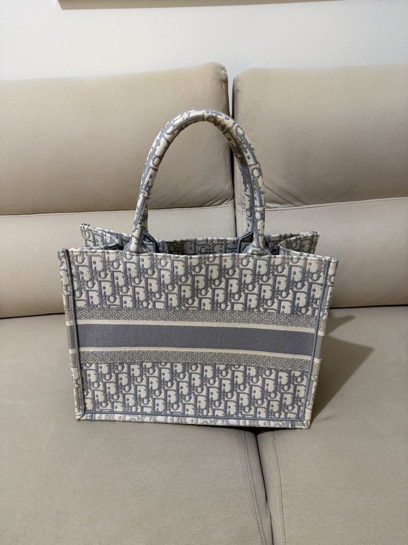 Dior Book Tote (Gray Oblique in Medium) (Category: Luxury Bags & Wallets) located in Mandaluyong City. Submitted by czegarcia (Listing ID 1432219303, Image 3). Description: - With dust bag, authenticity card, box and receipt. Bought this in July 2023 at Greenbelt, Makati. There are minor flaws (pls see photos, or message me for more detailed photos) RFS: I don’t find myself reaching for it anymore. It’s just in my closet for months now. .