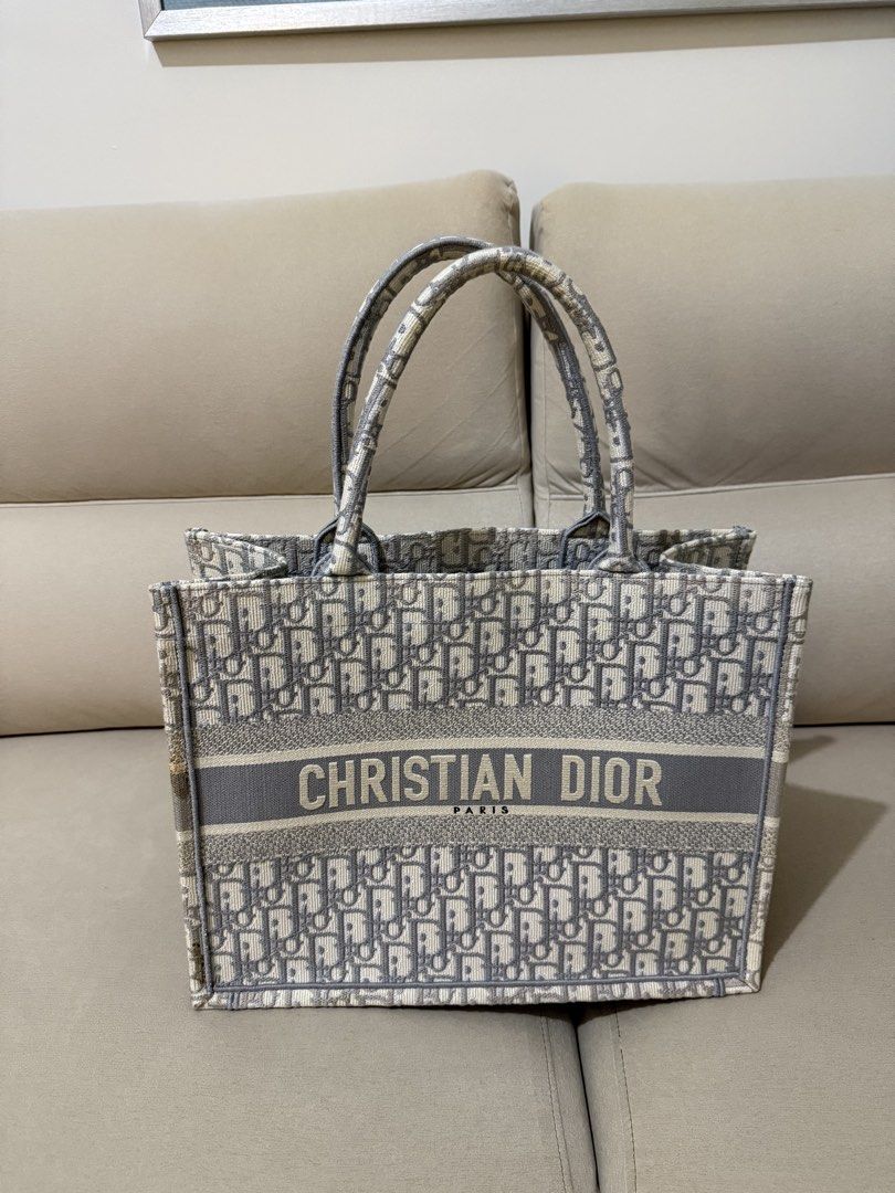 Dior Book Tote (Gray Oblique in Medium) (Category: Luxury Bags & Wallets) located in Mandaluyong City. Submitted by czegarcia (Listing ID 1432219303, Image 2). Description: - With dust bag, authenticity card, box and receipt. Bought this in July 2023 at Greenbelt, Makati. There are minor flaws (pls see photos, or message me for more detailed photos) RFS: I don’t find myself reaching for it anymore. It’s just in my closet for months now. .
