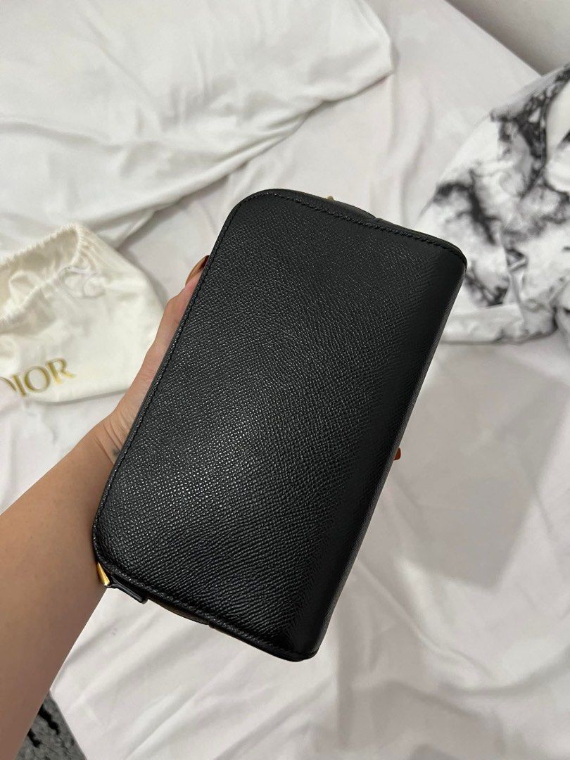 Dior Caro Double Pouch Bag (Category: Luxury Bags & Wallets) located in Malvar. Submitted by urgetosplurgeph (Listing ID 1432344206, Image 3). Description: ✨ FOR SALE ✨ Luxury designer crossbody pouch ✔️ Premium grained leather material ✔️ Gold-tone hardware ✔️ Can be worn as crossbody or handheld pouch ✔️ Elegant and timeless design 📌 Condition: Preloved – Visible signs of gentle use on hardware (see photos for details) – Still in good and func