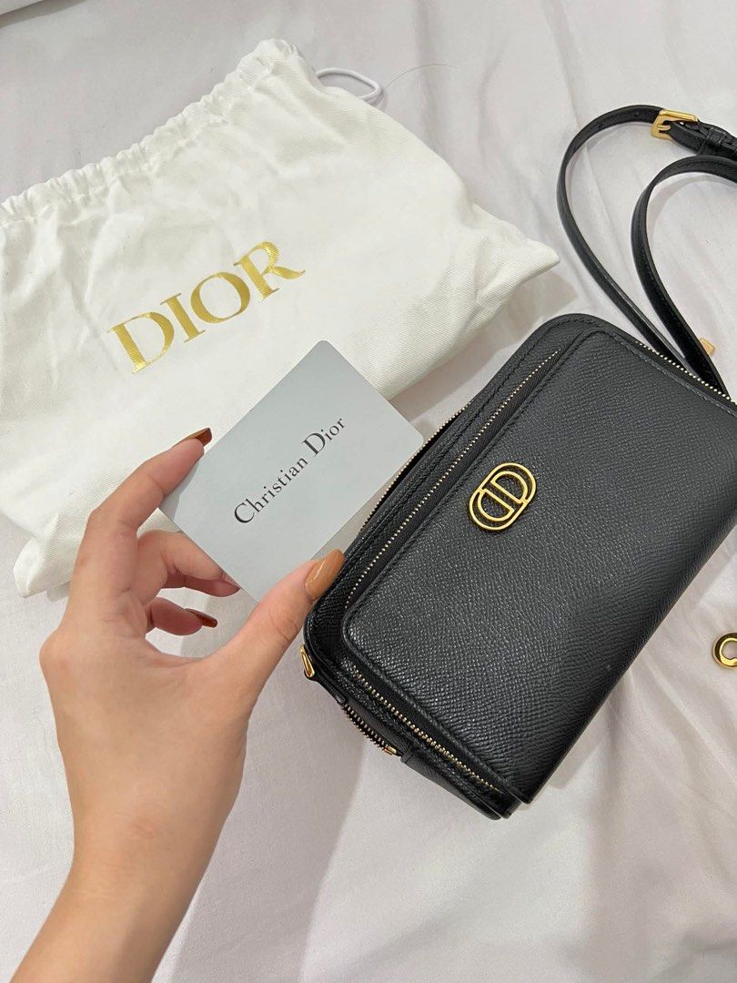 Dior Caro Double Pouch Bag (Category: Luxury Bags & Wallets) located in Malvar. Submitted by urgetosplurgeph (Listing ID 1432344206, Image 1). Description: ✨ FOR SALE ✨ Luxury designer crossbody pouch ✔️ Premium grained leather material ✔️ Gold-tone hardware ✔️ Can be worn as crossbody or handheld pouch ✔️ Elegant and timeless design 📌 Condition: Preloved – Visible signs of gentle use on hardware (see photos for details) – Still in good and func