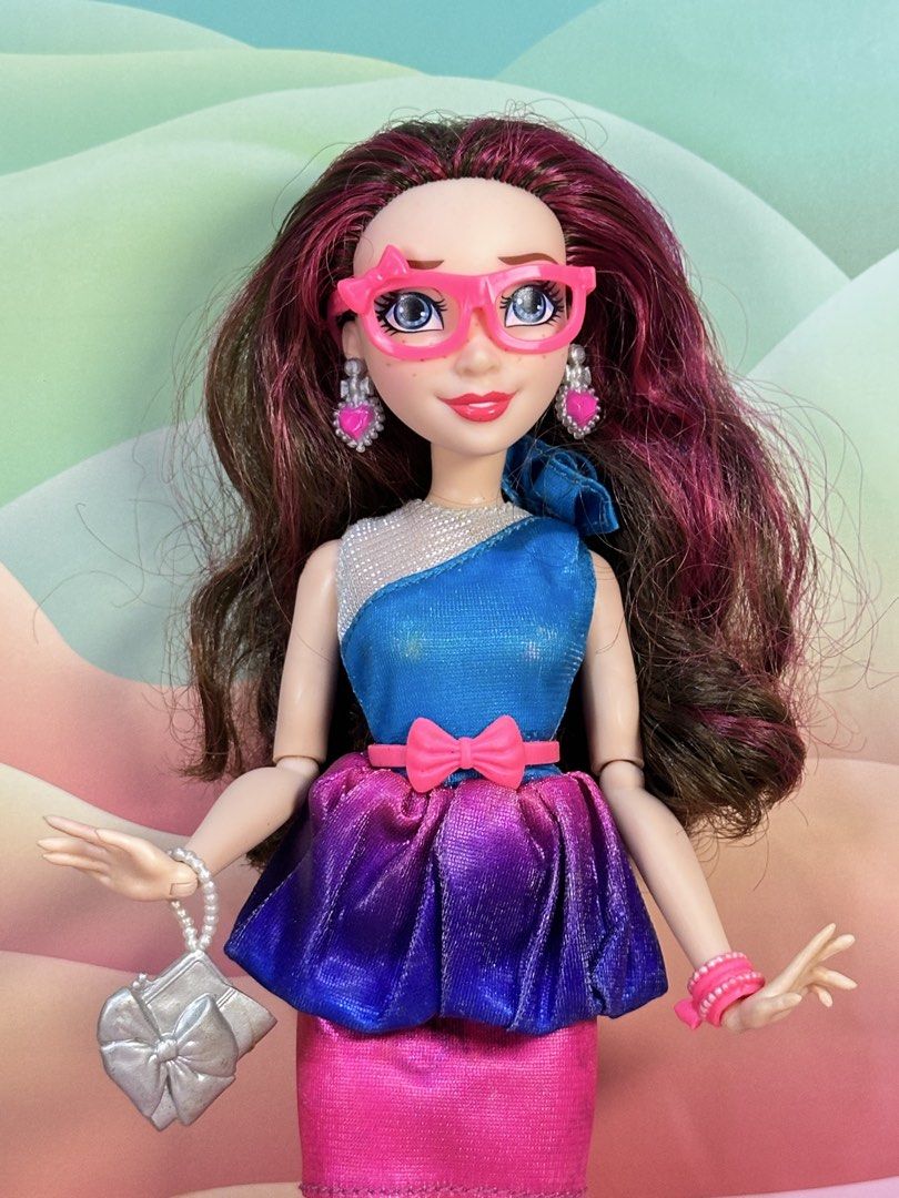 Disney Descendants Jane Neon Lights Doll (Category: Kids Toys) located in Cebu City. Submitted by danzysdaintydollies (Listing ID 1432331500, Image 2). Description: - Stylish fashion doll - Blue and pink dress - Pink tights and silver shoes - Long, wavy hair with pink highlights - Pink glasses and earrings - Silver purse and pink bracelet - Red lipstick.