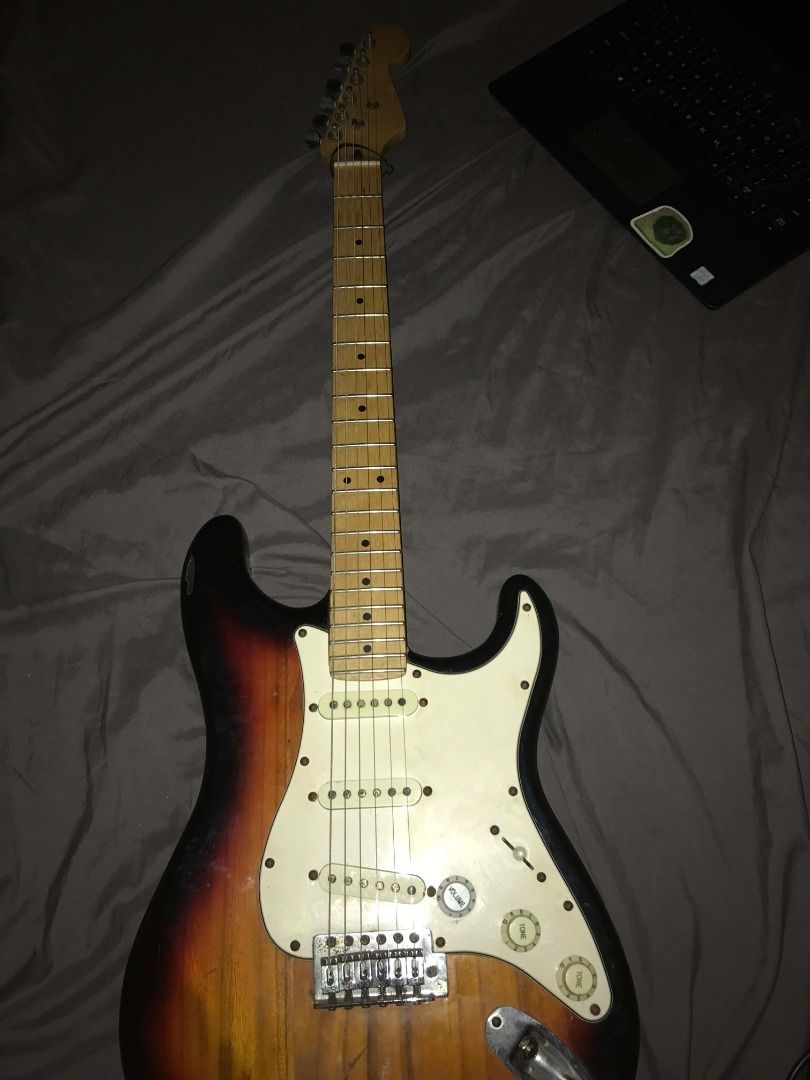 Electric Guitar Sunburst (Category: Musical Instruments) located in San Fernando. Submitted by purewolf_6e9051 (Listing ID 1432272845, Image 1). Description: Sunburst electric guitar (no brand) upgraded neck new strings rfs: nakastuck lang sa bahay.