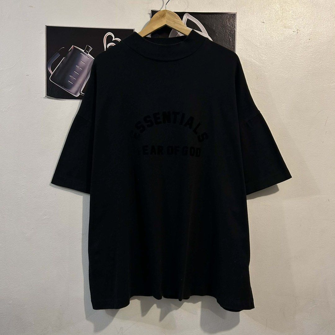 Essentials Fear of God Black T-shirt (Category: Tshirts & Polo Shirts ) located in Manila. Submitted by jakes_thrift_shop (Listing ID 1432371006, Image 1). Description: - Fear of God Essentials T-shirt - Size: M - Features the "Essentials" logo on the chest - Includes a Fear of God tag at the back - Made in Vietnam - Material: 100% cotton.