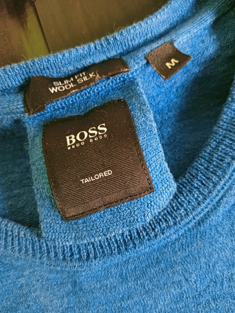 Hugo Boss Slim Fit Wool Silk Sweater (Category: Coats, Jackets and Outerwear) located in Quezon City. Submitted by justdoitcez (Listing ID 1432249894, Image 2). Description: - Hugo Boss sweater - Slim-fit design - Made from wool and silk - Crew neck and long sleeves - Vibrant blue color - Features a small metal BOSS logo - Size: Medium.
