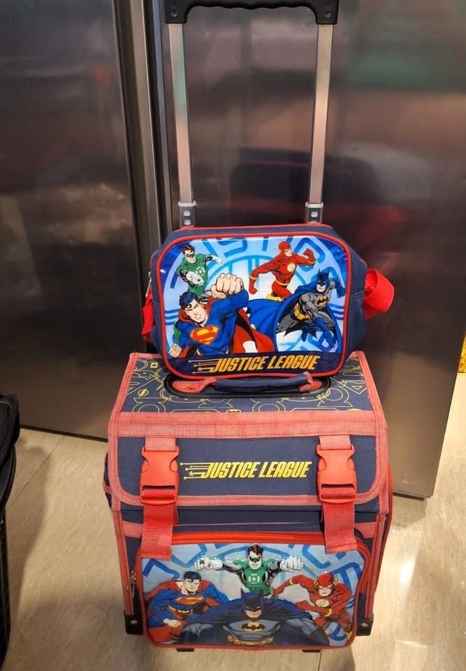 JL TROLLEY School Bag (Category: Backpacks) located in General Trias. Submitted by aeunice (Listing ID 1432355398, Image 1). Description: Brand: Justice League In Good Condition. Trolley Bag is luggage/ Rolling school backpack, made of an easy to clean and very durable polyester fabric Material. Large capacity: The school bag is large enough for school or weekend trip, even idea for long plane trip or international travel. Ideal for use in School