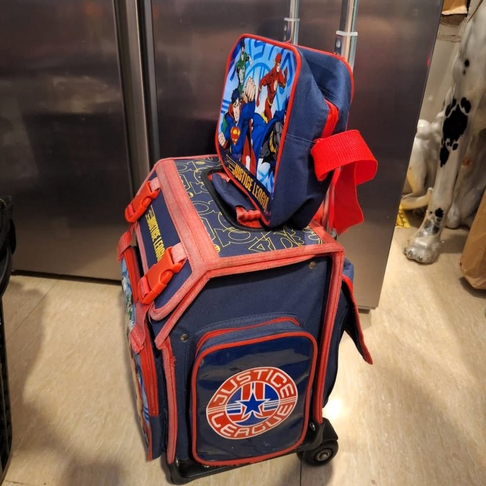 JL TROLLEY School Bag (Category: Backpacks) located in General Trias. Submitted by aeunice (Listing ID 1432355398, Image 3). Description: Brand: Justice League In Good Condition. Trolley Bag is luggage/ Rolling school backpack, made of an easy to clean and very durable polyester fabric Material. Large capacity: The school bag is large enough for school or weekend trip, even idea for long plane trip or international travel. Ideal for use in School