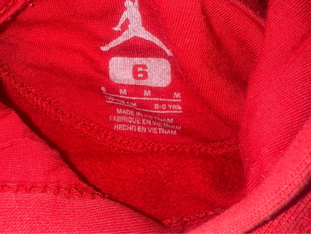 Jordan Kids Hoodie (Category: Babies & Kids Fashion) located in Caloocan City. Submitted by mochibolala13 (Listing ID 1432216793, Image 2). Description: Red Jordan hoodie for kids. Features a front pocket and a hood. The Jordan logo is printed on the front. The size is M, suitable for 5-6 years old. Made in Vietnam..