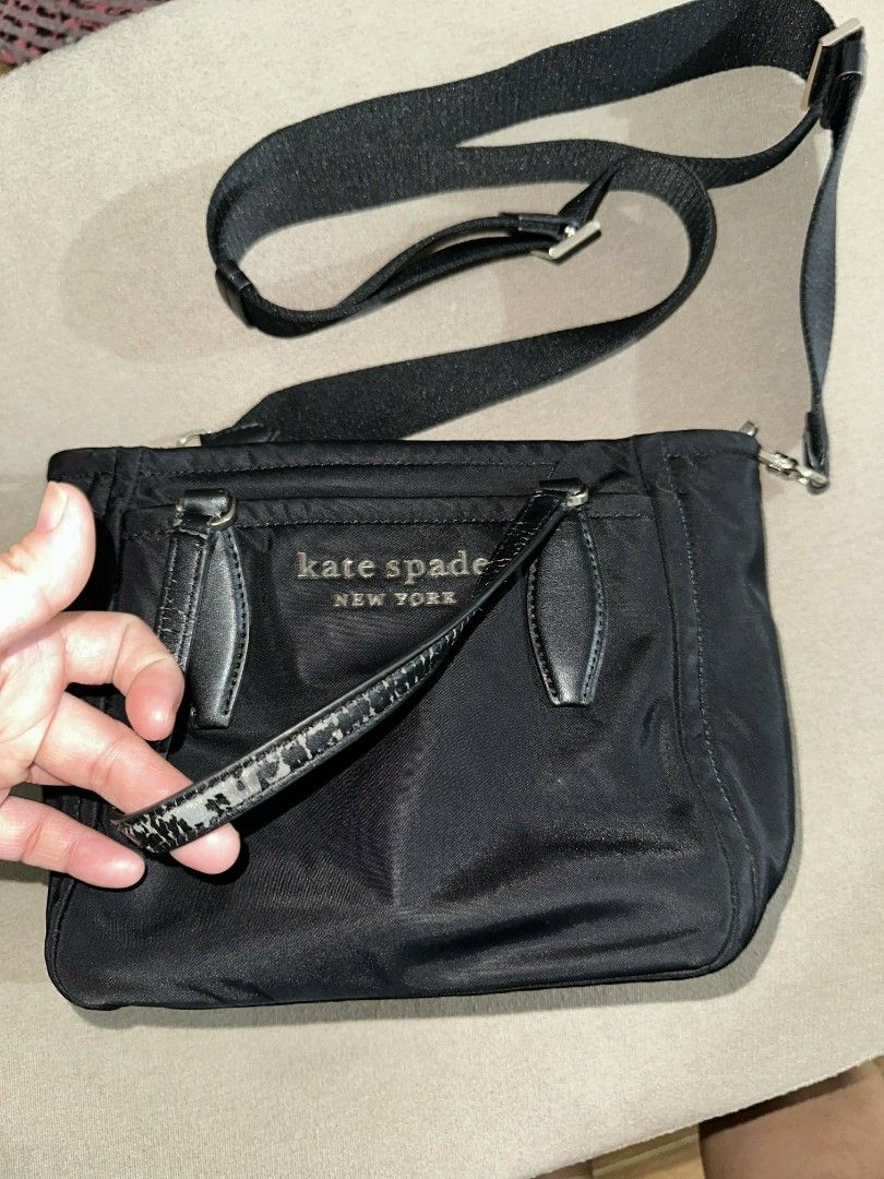 Kate Spade Crossbody Bag (Category: Luxury Bags & Wallets) located in Cavite. Submitted by premfinds (Listing ID 1432362874, Image 2). Description: orig KS Flaw sa handle leather part but over all nylon body in good condition.