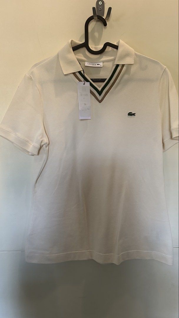 Lacoste Polo V Neck Slim fit (Category: Shirts) located in Manila. Submitted by kieli02 (Listing ID 1432281214, Image 3). Description: Authentic new Lacoste V Neck stretch slim fit in size 44. Wrong size bought. PM for inquiries. Dont buy if in doubt. .