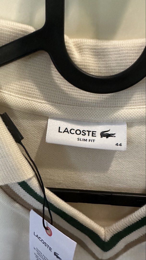 Lacoste Polo V Neck Slim fit (Category: Shirts) located in Manila. Submitted by kieli02 (Listing ID 1432281214, Image 2). Description: Authentic new Lacoste V Neck stretch slim fit in size 44. Wrong size bought. PM for inquiries. Dont buy if in doubt. .