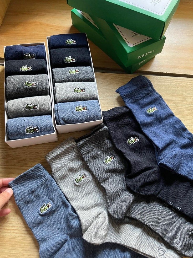 Lacoste Socks (Category: Socks) located in Mandaluyong City. Submitted by frivsthriftsph (Listing ID 1432199826, Image 1). Description: Last 2 boxes. See last photo for reference. 5 pairs & 5 colors per box. Brand new. Embroidered logo. For only 500 pesos per box..