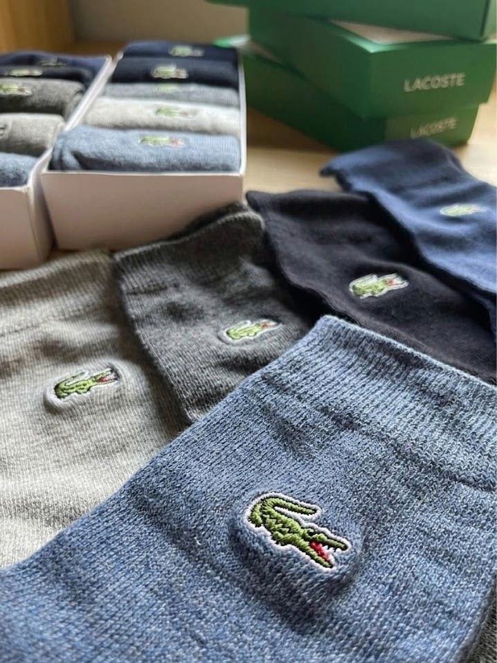 Lacoste Socks (Category: Socks) located in Mandaluyong City. Submitted by frivsthriftsph (Listing ID 1432199826, Image 3). Description: Last 2 boxes. See last photo for reference. 5 pairs & 5 colors per box. Brand new. Embroidered logo. For only 500 pesos per box..