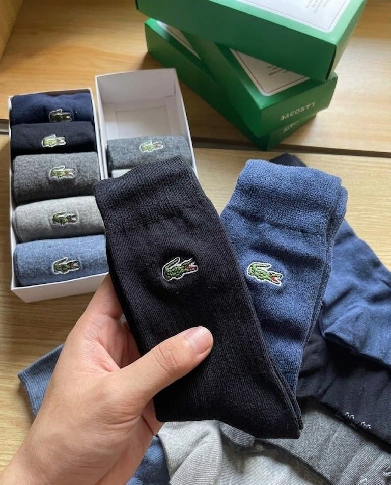 Lacoste Socks (Category: Socks) located in Mandaluyong City. Submitted by frivsthriftsph (Listing ID 1432199826, Image 2). Description: Last 2 boxes. See last photo for reference. 5 pairs & 5 colors per box. Brand new. Embroidered logo. For only 500 pesos per box..