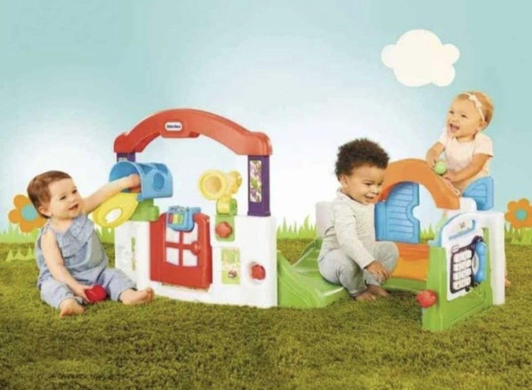 Little Tikes Playhouse (Category: Infant Playtime) located in Manila. Submitted by declutterbabythings (Listing ID 1432198251, Image 2). Description: Little Tikes playhouse features a slide, mailbox, and various interactive elements. It has a colorful design with a door, windows, and a telescope. The playhouse is designed for young children and provides a fun and engaging play environment..