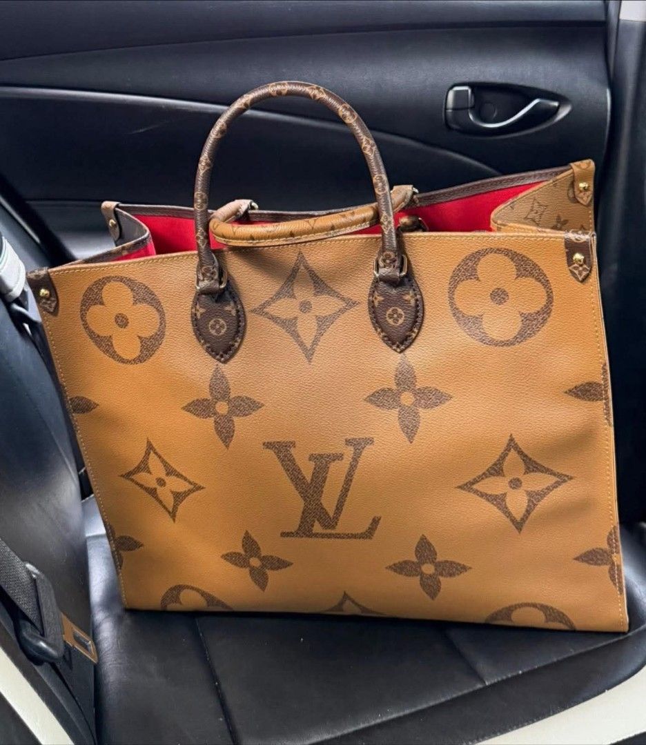Louis Vuitton OnTheGo GM Tote Bag (Category: Luxury Bags & Wallets) located in Cebu City. Submitted by forless.ph (Listing ID 1432237804, Image 1). Description: -💯 Authentic Louis Vuitton OnTheGo GM tote bag (purchased 2020) - Iconic Monogram Giant pattern - Spacious interior with red lining - Includes top handles and shoulder straps - Exterior color: Brown - Features the LV logo and Monogram flowers - money back guaranted 10x👌 .