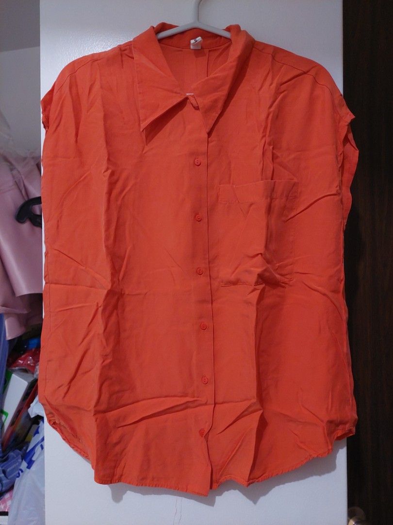 Mango Orange Sleeveless Button Down Top (Category: Blouses) located in Quezon City. Submitted by bennybonanza (Listing ID 1432389545, Image 1). Description: MANGO womens orange sleeveless blouse Size small but loose fit Pls manage your expectations, items are all preloved, personally owned. Not ukay. Delivery c/o Buyer. Pickup QC near Opus Mall..
