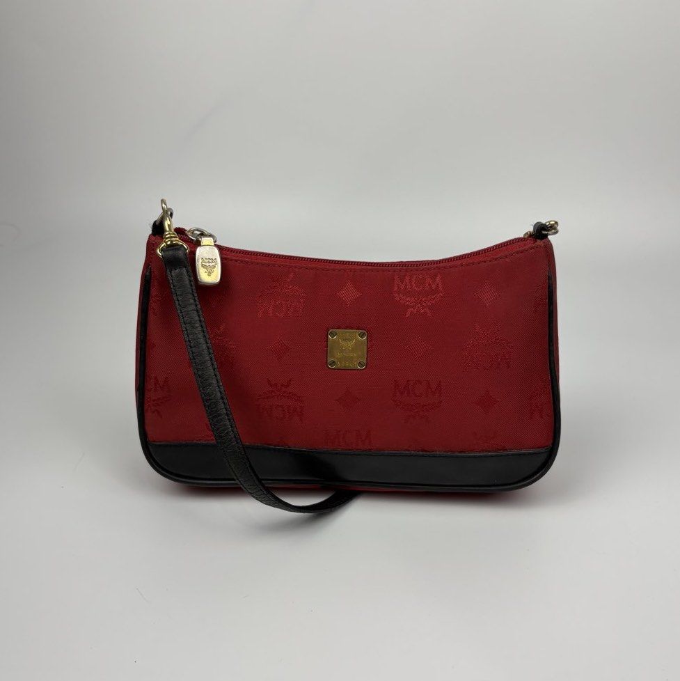 Mcm Red Baguette Bag (Category: Luxury Bags & Wallets) located in Bacolod City. Submitted by cast.archives (Listing ID 1432375580, Image 1). Description: Mcm Red Baguette Bag Authentic Size: Small Condition: Good Flaw: Sign of used (handle).