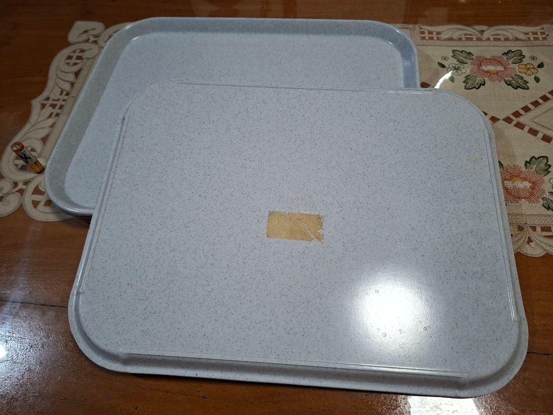 Melamine Serving Trays Set of 4 (Category: Dinnerware & Cutlery) located in Taguig. Submitted by d_man11 (Listing ID 1432218676, Image 3). Description: - Set of 4 rectangular serving trays - Light blue speckled design - Made of durable melamine - Stackable for easy storage Dimensions: 45 x 35 cm.