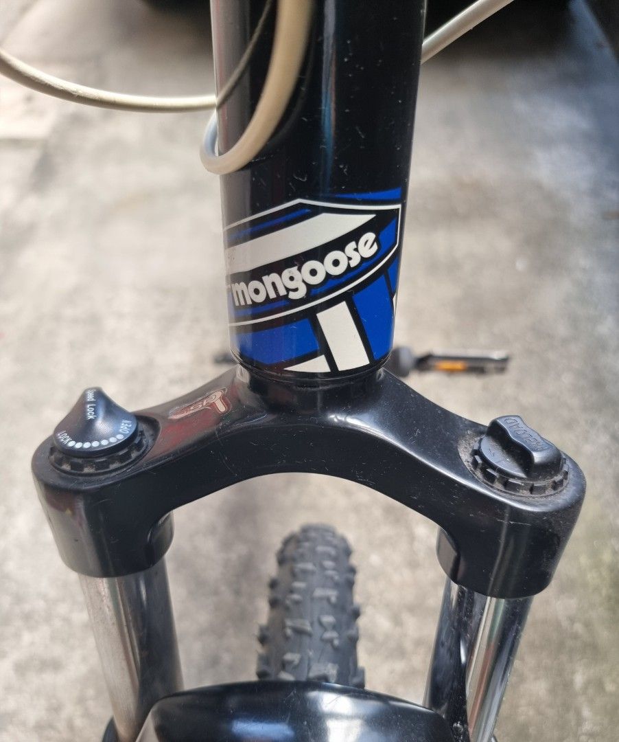 Mongoose Mountain Bike (Category: Bicycles) located in Makati City. Submitted by warlock2293 (Listing ID 1432353995, Image 1). Description: - Mongoose mountain bike 26er - Front suspension - Disc brakes - Shimano derailleurs - Geax Gato tires - Black frame with blue and white accents - Includes saddle - Includes handlebar grips - Water bottle cage Reprice Php 10k.
