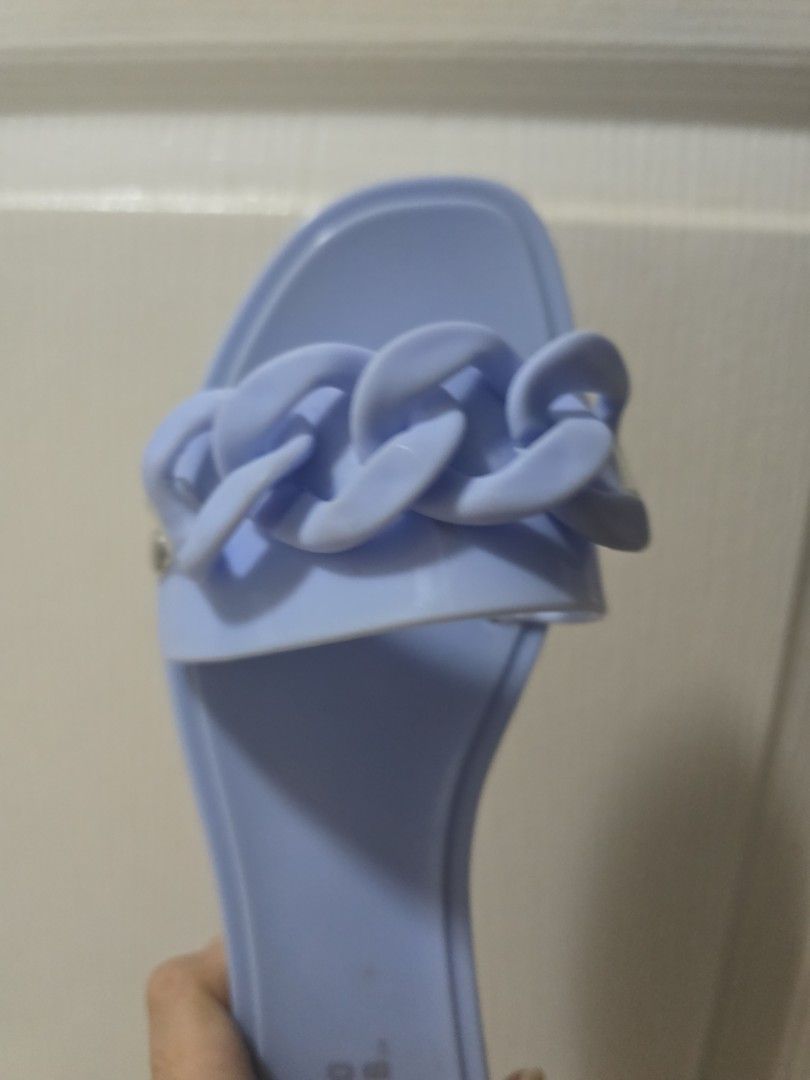 Montego Bay Club Sandals (Category: Sandals) located in Pasig City. Submitted by callmemaf (Listing ID 1432292963, Image 3). Description: - sole can be washed, entire sandal is rubber - Light blue color - Stylish chain detail on strap - Light blue footbed with brand name - Shows some wear on soles - Ideal for casual wear.