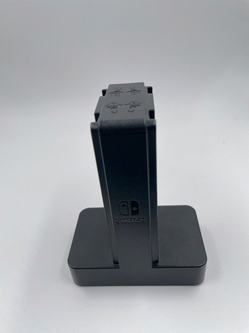 Nintendo Switch Joy-Con Grip (Category: Controllers) located in Caloocan City. Submitted by blvck_rabbit_ph (Listing ID 1432289554, Image 3). Description: - Comfortable Joy-Con grip for Nintendo Switch. - Sleek black finish. - Designed for easy use. - Features a charging dock for Joy-Cons. - Improves gaming comfort and experience. 💰: BPI, Gcash, Maya, Cash - In Person 🚚 : LBC, Lalamove, J & T Express 📍: SM Caloocan & SM Fairview & Meycuayan On