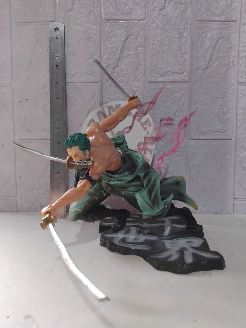 One Piece Luffy and Zoro Figures (Category: Figurines & Statues) located in Bulacan. Submitted by rowmon24 (Listing ID 1432280275, Image 3). Description: - One Piece Luffy and Zoro figures - Luffy: Dynamic pose, red outfit, detailed base, clear plastic packaging - Zoro: Fighting stance with swords - Both figures include original boxes -One Piece Figures SetOne Piece Statue HQKO , 3 BiG Figure.
