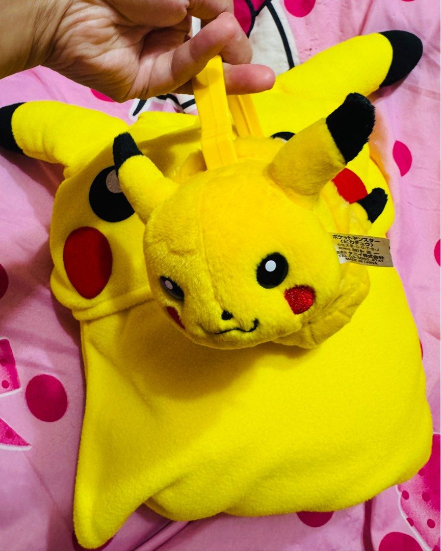 Pokemon Pikachu Onesie with Earmuffs (Category: Babies & Kids Fashion) located in Lipa City. Submitted by twinklexpress (Listing ID 1432240806, Image 3). Description: - Adorable Adult Pikachu onesie! - Includes matching yellow earmuffs. - Onesie features Pikachu's face on the hood. - Button-down front for easy wear. - Earmuffs also have Pikachu's face. - Perfect for Pokemon enthusiasts!.
