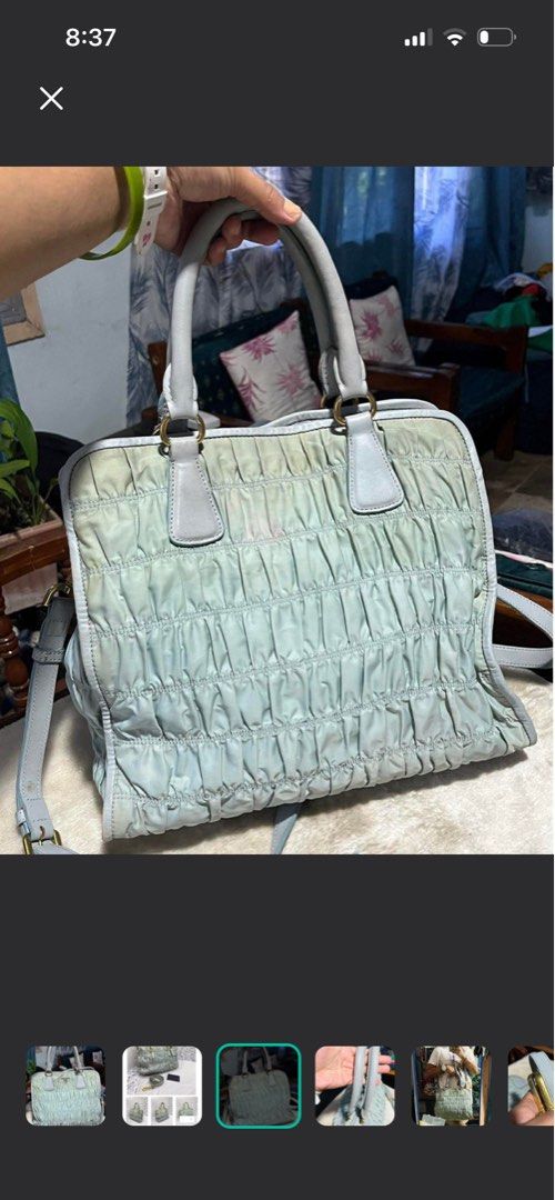 Prada Tessuto Gaufre Tote Bag Light Green (Category: Ear Care) located in Mandaue City. Submitted by chuchi152615 (Listing ID 1432307942, Image 3). Description: - Prada Tessuto Gaufre tote bag - Light blue color - Ruched design - Top handles and detachable shoulder strap - Prada logo lining and zipper closure - Gold-tone hardware - Prada logo on front - Made in Italy.