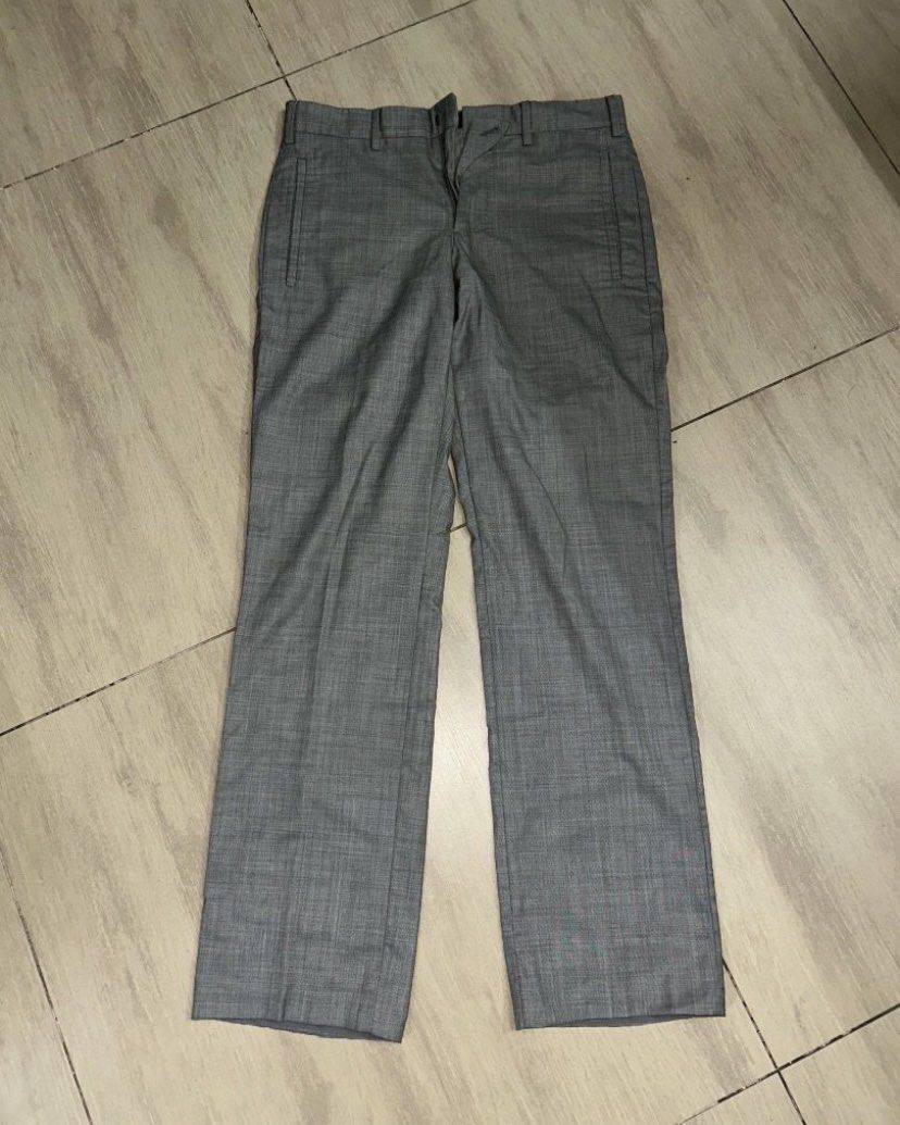 Prada Wool Trousers (Category: Trousers) located in Digos. Submitted by z_declutter (Listing ID 1432254117, Image 1). Description: Prada Grey Wool Trousers Size: 30” Waist Material: 100% Virgin Wool Classic Straight / Wide Straight Excellent fabric and constructed so well Authentic - you can run a legit check.