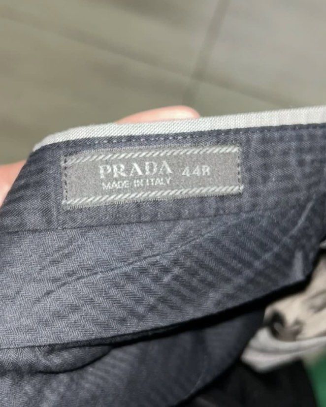 Prada Wool Trousers (Category: Trousers) located in Digos. Submitted by z_declutter (Listing ID 1432254117, Image 2). Description: Prada Grey Wool Trousers Size: 30” Waist Material: 100% Virgin Wool Classic Straight / Wide Straight Excellent fabric and constructed so well Authentic - you can run a legit check.