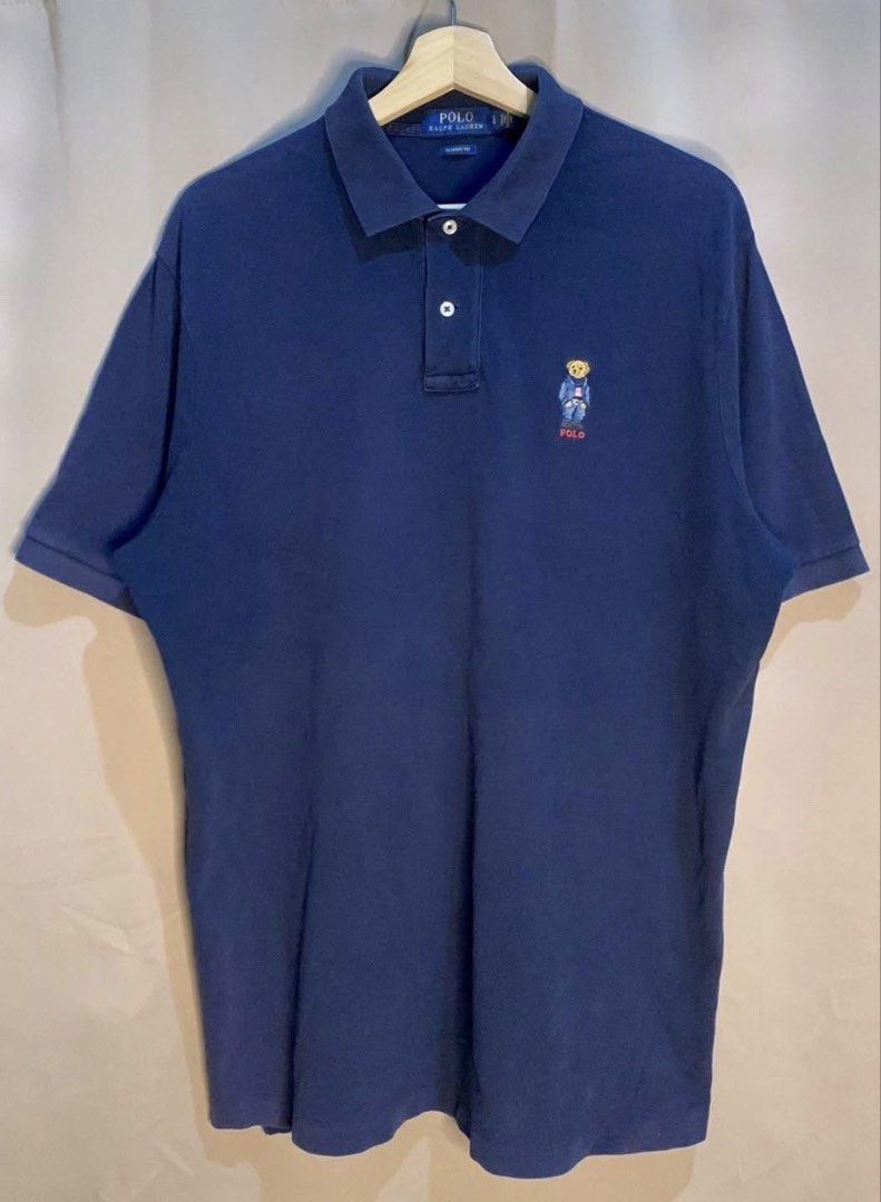 Ralph Lauren Polo Bear (Category: Tshirts & Polo Shirts ) located in Manila. Submitted by z_ware (Listing ID 1432374757, Image 2). Description: Ralph Lauren Polo Bear polo shirt - Navy blue Polo Ralph Lauren shirt - Classic fit - Size L - 23.5 x 30 - 9/10 color rate - Good Condition - minimal neckline, slit and minimal fade sa lower left side -can do lalamove or jnt.