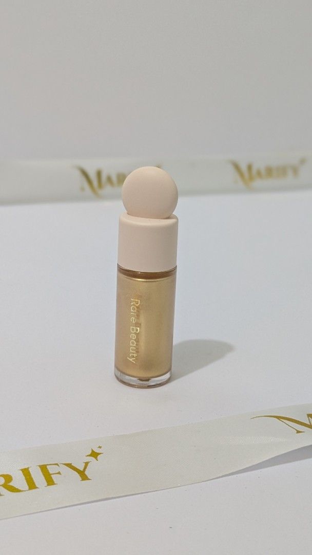 Rare Beauty Liquid Luminizer (Category: Makeup) located in Cabuyao City. Submitted by marifyyy (Listing ID 1432262585, Image 1). Description: - Rare Beauty Liquid Luminizer Mini - Shade: Outshine - new | bottle only.