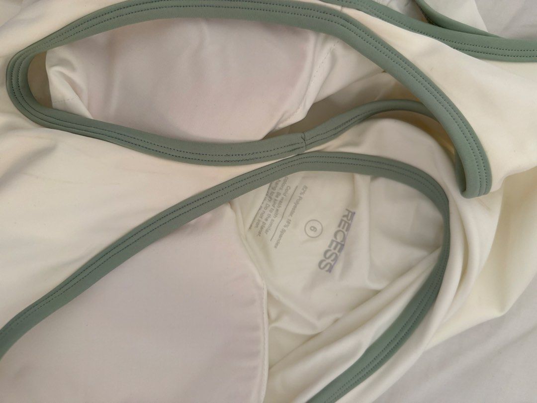 Recess Tennis Dress (Category: Activewear) located in Quezon City. Submitted by mochiringo84 (Listing ID 1432220768, Image 2). Description: - Never used - Recess tennis dress - White with green trim - Size 6 - Built-in bra - Flattering fit - Made of 82% nylon, 18% spandex - Perfect for tennis and active wear.