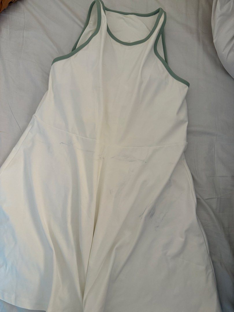 Recess Tennis Dress (Category: Activewear) located in Quezon City. Submitted by mochiringo84 (Listing ID 1432220768, Image 1). Description: - Never used - Recess tennis dress - White with green trim - Size 6 - Built-in bra - Flattering fit - Made of 82% nylon, 18% spandex - Perfect for tennis and active wear.