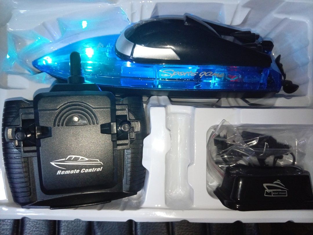 Remote Control speed Boat (Category: Remote Control Toys) located in Manila. Submitted by jackmdcm (Listing ID 1432292955, Image 2). Description: - Sleek remote control boat - Stylish blue and black design - Comes with remote control, battery, and charger - Equipped with LED lights - Sports Game model - Ready to use! Loc tatalon qc .