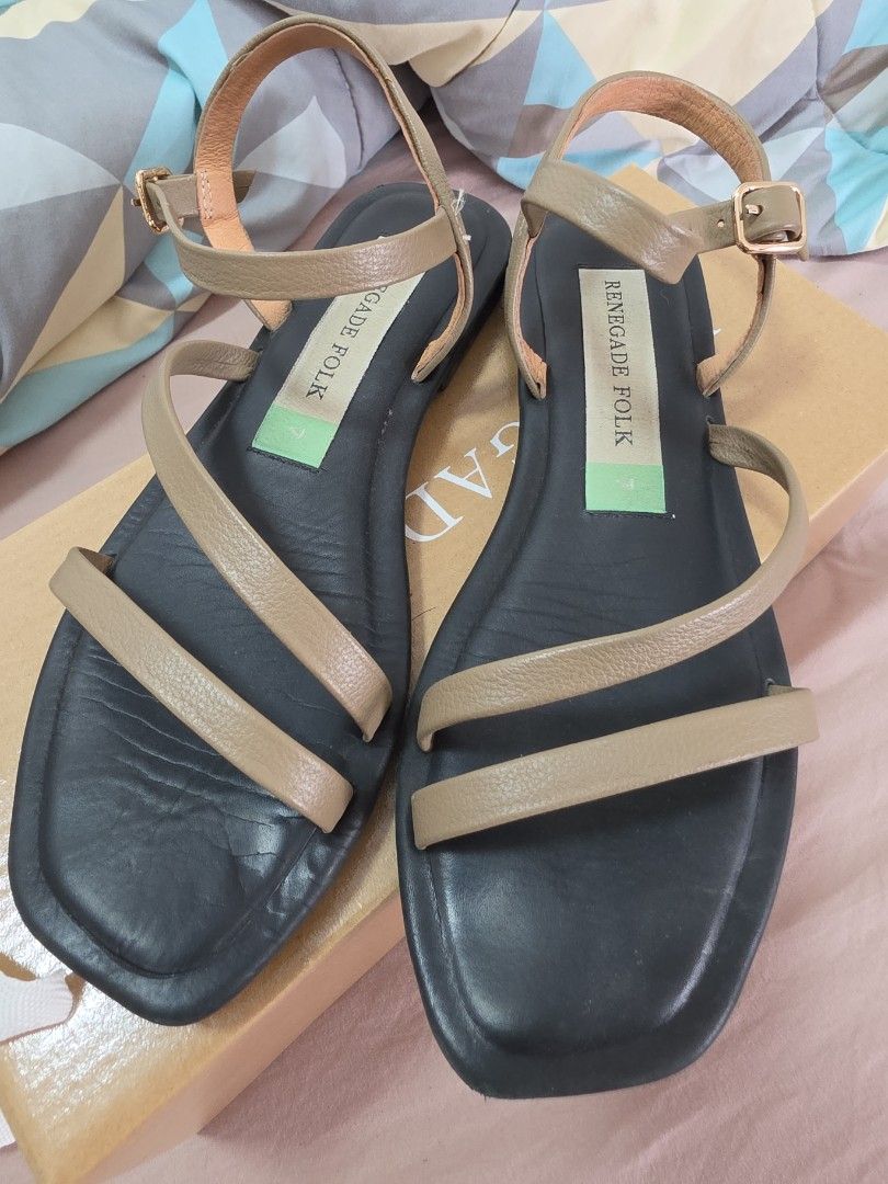 Renegade Folk Slow Down Soft insoles Sandals (Category: Flats & Sandals) located in Quezon City. Submitted by thrift_mom (Listing ID 1432203159, Image 1). Description: - Renegade Folk sandals - Black footbed, Taupe straps - Buckle closure - Comes with original box - Perfect for casual wear - Comfortable and chic - Originally Priced at 2990 - RFS: Decluttering .