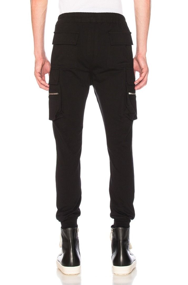 Rick Owens - F/W 17 - Cargo Jogger (Category: Joggers) located in Manila. Submitted by graymatter_ (Listing ID 1432298044, Image 3). Description: Rick Owens - F/W 17 - Cargo Jogger Tagged Size: 46 Condition: 9/10 Flaws: Overall Minor Fading Material: 100% Cotton Zipper: Raccagni Made in: Italy Dimensions Waist: 27-30 Inseam: 27 Crotch: 12.5 Thigh: 10 Leg Opening: 3.5-5.5 .