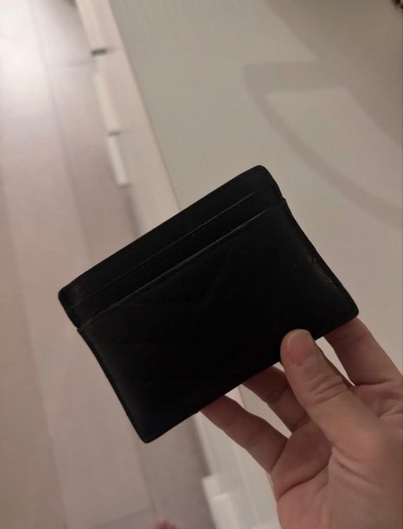 Saint Laurent Card Holder (Category: Luxury Bags & Wallets) located in Dasmarinas. Submitted by joy_declutteringacct (Listing ID 1432224375, Image 2). Description: - Authentic Saint Laurent card holder - Black with gold-tone logo - Quilted design - Multiple card slots - Black interior - Compact size - Ideal for everyday use.