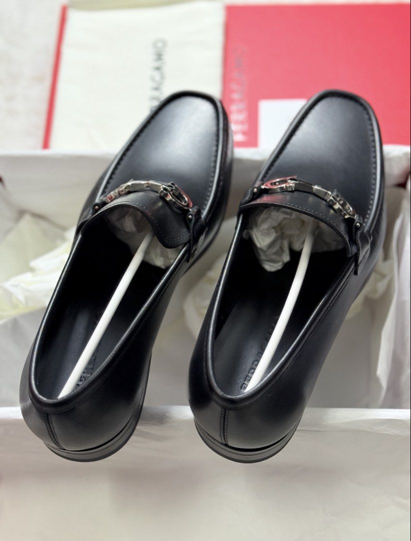 Salvatore Ferragamo Black Leather Loafers (Category: Loafers) located in Manila. Submitted by levelup0 (Listing ID 1432207149, Image 2). Description: - Salvatore Ferragamo loafers - Black leather - New with original box - Silver-tone buckle detail - Classic loafer style - Ideal for formal and smart casual outfits - Made with high-quality leather.