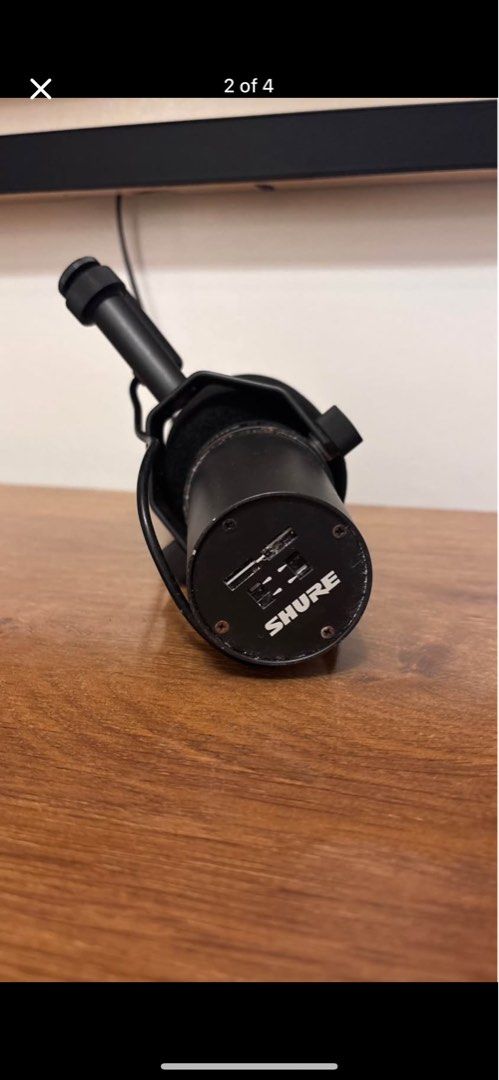 Shure SM7B Dynamic Microphone (Category: Microphones) located in Manila. Submitted by razalic (Listing ID 1432333031, Image 2). Description: - Shure SM7B dynamic microphone - Sleek black finish - Integrated windscreen - Robust metal construction - Includes stand mount - Features XLR connector - Authentic Shure logo.