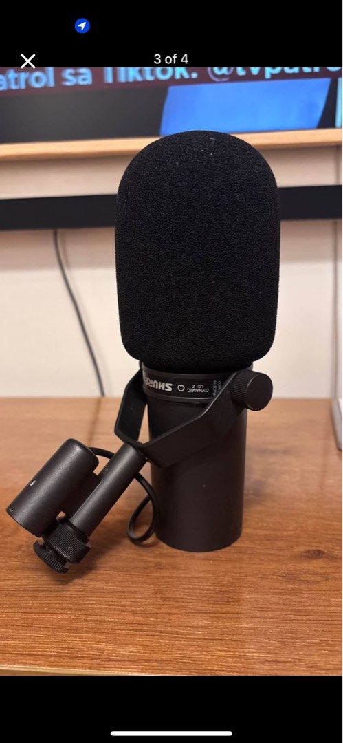 Shure SM7B Dynamic Microphone (Category: Microphones) located in Manila. Submitted by razalic (Listing ID 1432333031, Image 3). Description: - Shure SM7B dynamic microphone - Sleek black finish - Integrated windscreen - Robust metal construction - Includes stand mount - Features XLR connector - Authentic Shure logo.