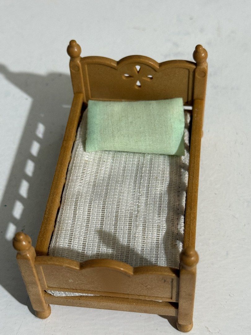 Sylvanian Families Wood Design Brown Bed Miniature House Furniture Accessory w/ pillow & cushion (Category: Kids Toys) located in Antipolo. Submitted by kiksy.closet (Listing ID 1432294955, Image 3). Description: - one edge is slightly broken + w scratches as seen on pics - check pics to evaluate condition.