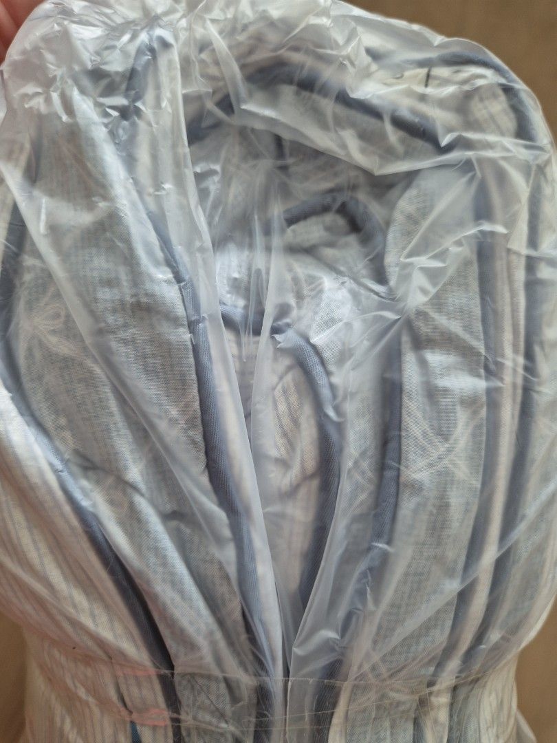 Tencel Comforter from Korea (Category: Bedding & Towels) located in Singapore. Submitted by odreamer (Listing ID 1432228847, Image 3). Description: Bought from Gwangjang Market in Seoul in Mar 2026. Bought 3 comforters. Letting go of one. Tencel. Single size. All seasons (3 levels of thickness - summer, all seasons, winter). Suitable for use in aircon room in Sg. Still in vacuum pack. Light blue color..