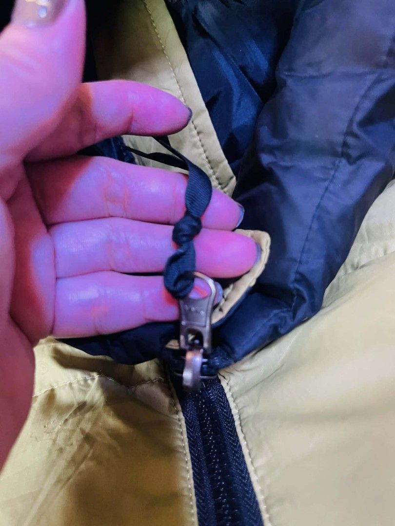 The North Face Puffer Jacket (Category: Coats, Jackets and Outerwear) located in Bulacan. Submitted by fenph2021 (Listing ID 1432248493, Image 3). Description: - The North Face Puffer Jacket - Two-tone design: Black upper, Light Green lower - Full-length zipper ykk - Two side pockets - Adjustable cuffs - The North Face logo on chest and inside - Well-padded for warmth no flaw like new ykk zipper m for men l -xl for women last price posted orig.