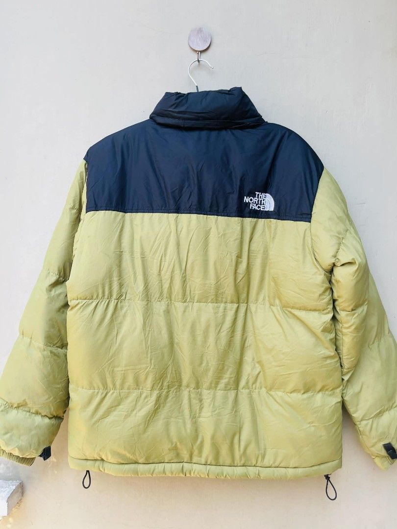 The North Face Puffer Jacket (Category: Coats, Jackets and Outerwear) located in Bulacan. Submitted by fenph2021 (Listing ID 1432248493, Image 2). Description: - The North Face Puffer Jacket - Two-tone design: Black upper, Light Green lower - Full-length zipper ykk - Two side pockets - Adjustable cuffs - The North Face logo on chest and inside - Well-padded for warmth no flaw like new ykk zipper m for men l -xl for women last price posted orig.