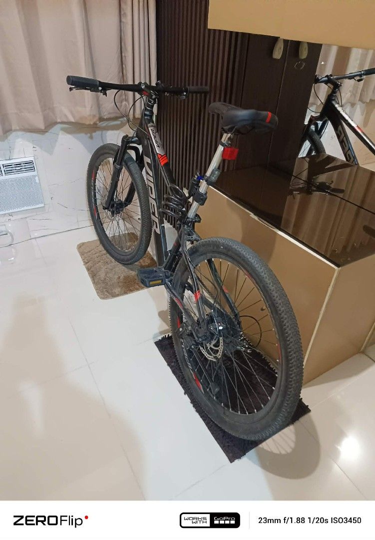 Viper Mountain Bike (Category: Bicycles) located in Manila. Submitted by armiemb1974 (Listing ID 1432267319, Image 3). Description: - Black Viper mountain bike - Features front suspension and disc brakes - Comfortable saddle - Includes bike lock - Tires with good tread for various terrains - Sporty look with red accents on frame and wheels ......