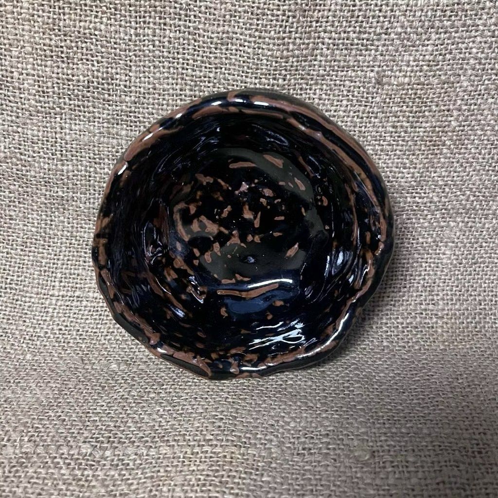Wabi sabi Bowl (Marked) (Category: Other Kitchenware & Tableware) located in Bulacan. Submitted by ceramicscubby (Listing ID 1432337738, Image 2). Description: Size: 4.8 x 5 D; 2.25 H in. ❗️CLOSING DOWN SALE, ALL PRICES ARE MARKED DOWN. WE WILL NOT BE ACCEPTING OFFERS LOWER THAN OUR ASKING PRICE. ❗️ - Handmade ceramic bowl - Dark blue interior - Textured, brown-edged rim - Speckled, glossy exterior finish - Irregular shape - Ideal for small items